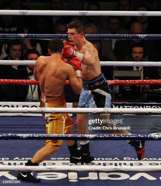 Ricky Hatton of Great Britain and Vyacheslav Senchenko of Ukraine exchange blows during their welterweight bout at MEN Arena on November 24, 2012 in...
