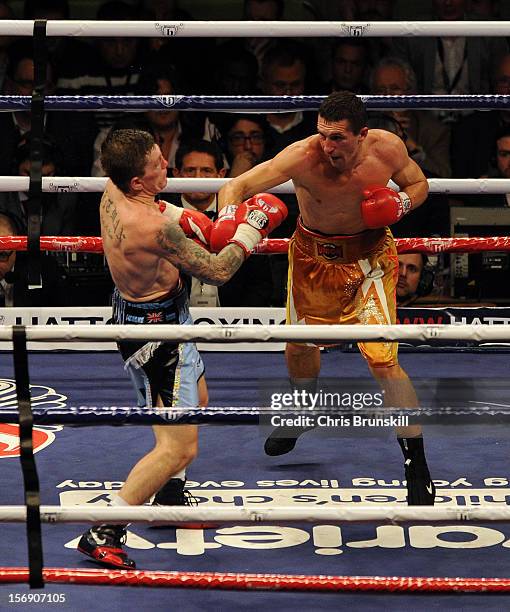 Ricky Hatton of Great Britain and Vyacheslav Senchenko of Ukraine exchange blows during their welterweight bout at MEN Arena on November 24, 2012 in...