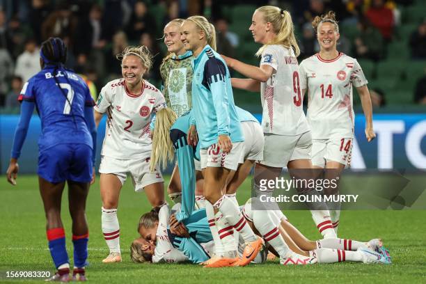 Denmark's players celebrate at the end of the Australia and New Zealand 2023 Women's World Cup Group D football match between Haiti and Denmark at...