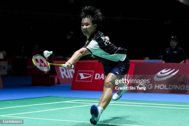 He Bingjiao of China competes in the Women's Singles First Round match against Mia Blichfeldt of Denmark on day one of the Japan Open at Yoyogi...