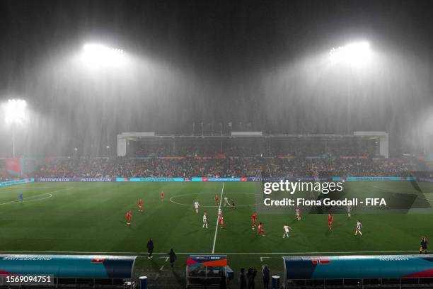 Rain pours during the FIFA Women's World Cup Australia & New Zealand 2023 Group A match between Switzerland and Norway at Waikato Stadium on July 25,...