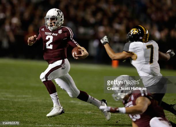 Texas A&M Aggies quarterback Johnny Manziel rushes for a gain during their game against the Missouri Tigers at Kyle Field on November 24, 2012 in...