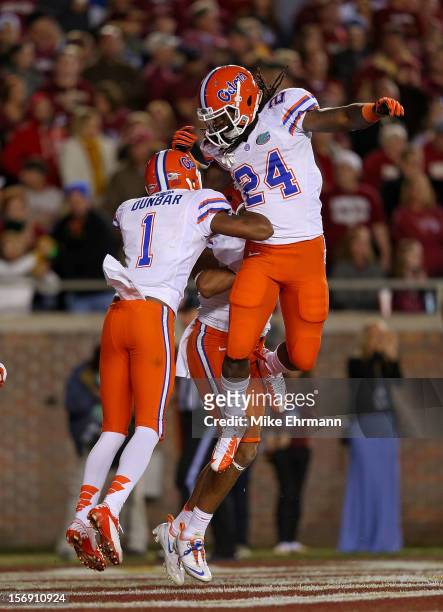 Matt Jones of the Florida Gators celebrates a touchdown with Quinton Dunbar during a game against the Florida State Seminoles at Doak Campbell...