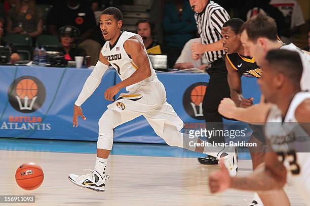 Phil Pressey of the Missouri Tigers dribbles up court against the Virginia Commonwealth Rams during the Battle 4 Atlantis tournament at Atlantis...