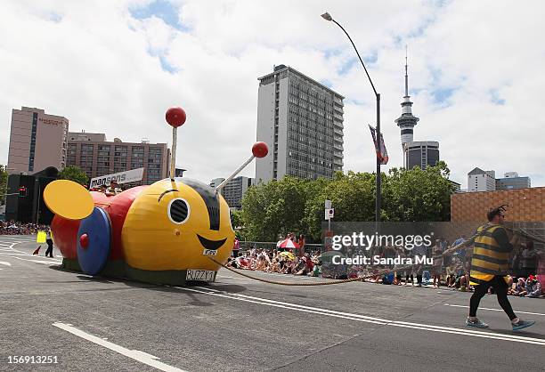 The iconic Buzy Bee features in the annual Farmers Santa Parade on November 25, 2012 in Auckland, New Zealand. For 78 years the Farmers Santa Parade...