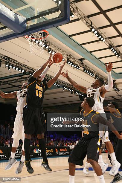 Jarred Reddic of the Virgina Commonwealth Rams grabs a rebound over Alex Oriakhi of the Missouri Tigers during the Battle 4 Atlantis tournament at...