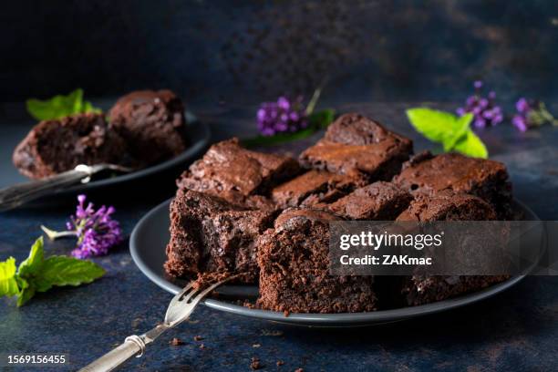 chocolate brownie cakes on a dark background - stock photo - chocolate cake stock pictures, royalty-free photos & images