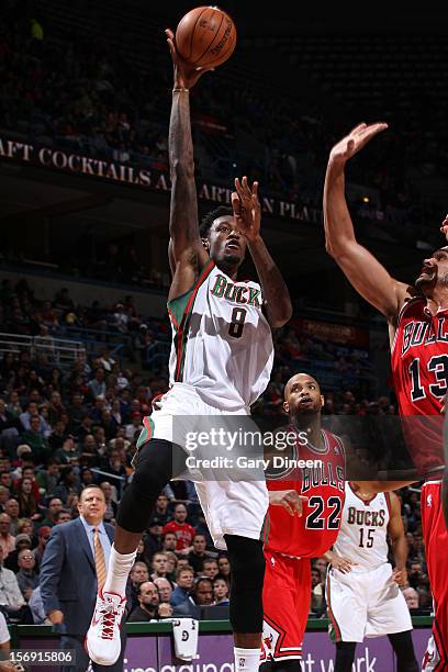 Larry Sanders of the Milwaukee Bucks shoots against Joakim Noah of the Chicago Bulls during the NBA game on November 24, 2012 at the BMO Harris...