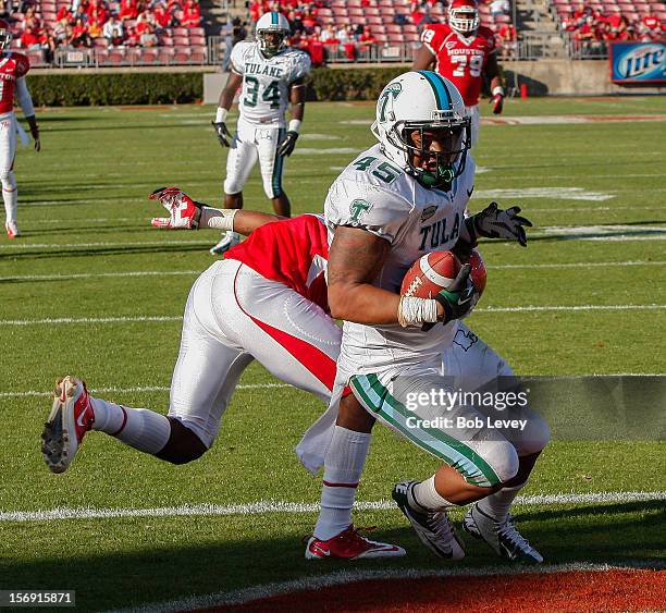 Matthew Bailey of the Tulane Green Wave intercepts a pass for Braxton Welford of the Houston Cougars at Robertson Stadium on November 24, 2012 in...