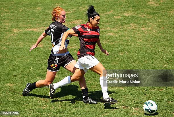 Tori Huster of the Jets and Trudy Camilleri of the Wanderers contest possession during the round six W-League match between the Western Sydney...