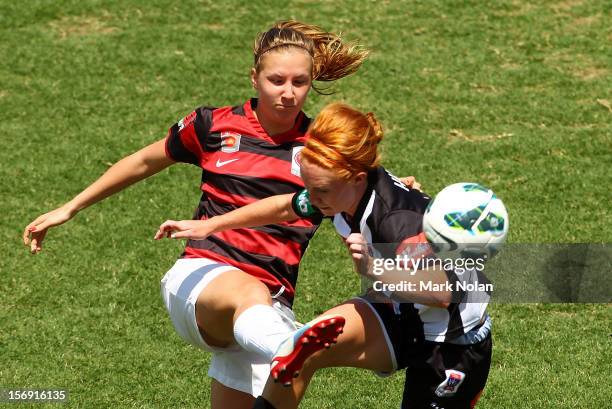 Louise Fors of the Wanderers and Tori Huster of the Jets contest possession during the round six W-League match between the Western Sydney Wanderers...