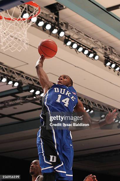 Rasheed Sulaimon of the Duke Blue Devils dunks against the Louisville Cardinals during the Battle 4 Atlantis tournament at Atlantis Resort November...