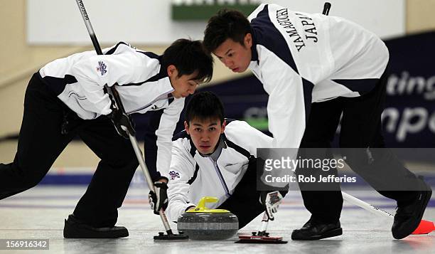 Tetsuro Shimizu of Japan during the Pacific Asia 2012 Curling Championship at the Naseby Indoor Curling Arena on November 25, 2012 in Naseby, New...
