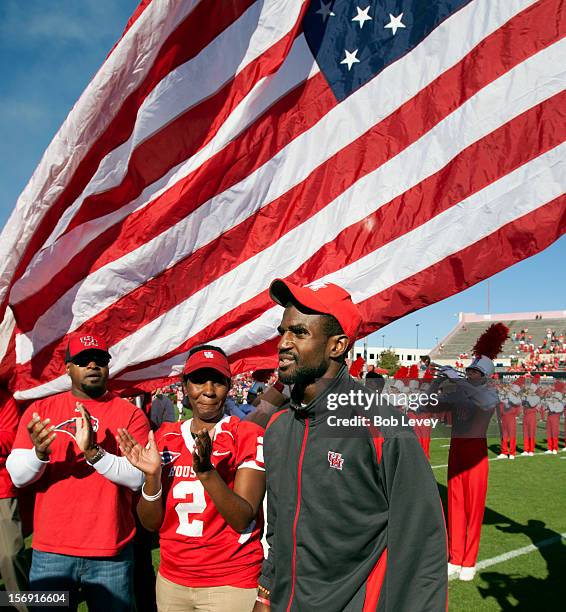 Hayden of the Houston Cougars makes an appearance on the field for the first time after he was severely injured during a practice session weeks ago,...