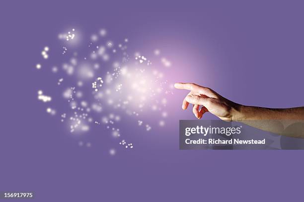 energy orbs and hand - populations boom stock pictures, royalty-free photos & images