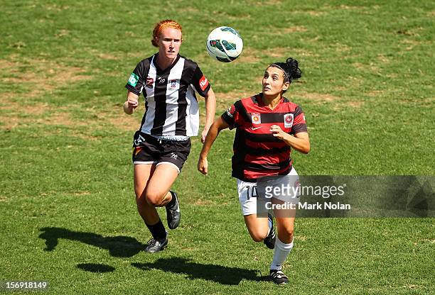 Tori Huster of the Jets and Trudy Camilleri of the Wanderers contest possession during the round six W-League match between the Western Sydney...