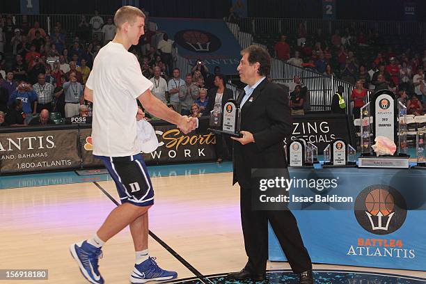 Mason Plumlee of the Duke Blue Devils accepts his all tournament player award at the Battle 4 Atlantis tournament at Atlantis Resort November 24,...