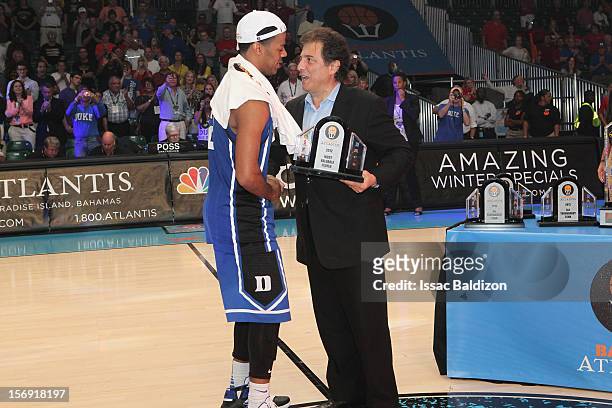 Quinn Cook of the Duke Blue Devils accepts the Most Valuable Player award at the Battle 4 Atlantis tournament at Atlantis Resort November 24, 2012 in...