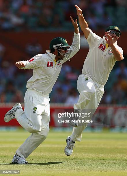 Ed Cowan of Australia celebrates with David Warner of Australia after catching Jacques Rudolph of South Africa during day four of the Second Test...