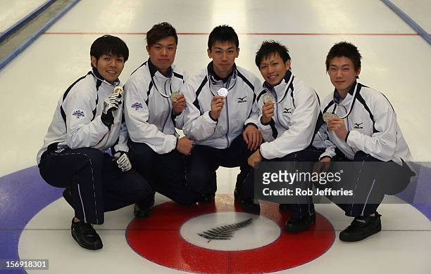 The Japan men's team of Yusuke Morozumi, Tsuyoshi Yamaguchi, Tetsuro Shimizu, Kosuke Morozumi and Yoshiro Shimizu pose for a photo during the Pacific...