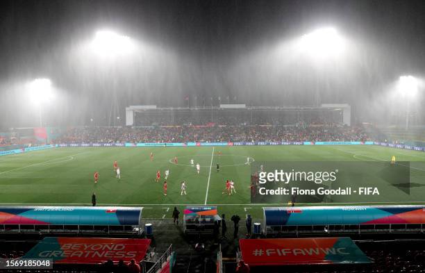 Rain pours during the FIFA Women's World Cup Australia & New Zealand 2023 Group A match between Switzerland and Norway at Waikato Stadium on July 25,...