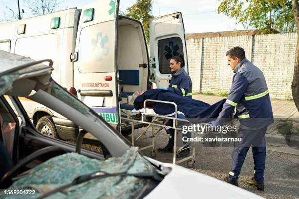 emergency services at crash site - broken glass on road stock pictures, royalty-free photos & images