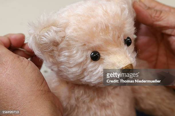 Teddy bear is completed at the Steiff stuffed toy factory on November 23, 2012 in Giengen an der Brenz, Germany. Founded by seamstress Margarethe...
