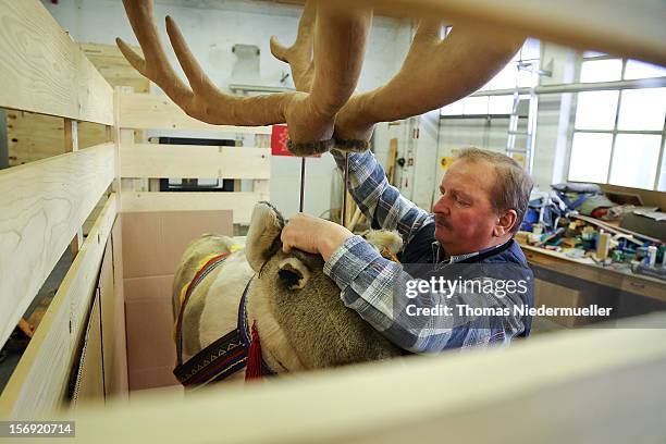 Worker prepares a reindeer at the Steiff stuffed toy factory on November 23, 2012 in Giengen an der Brenz, Germany. Founded by seamstress Margarethe...