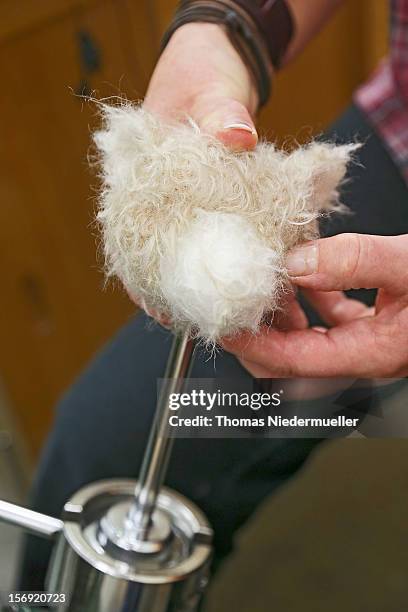 Worker stuffs teddy bear parts at the Steiff stuffed toy factory on November 23, 2012 in Giengen an der Brenz, Germany. Founded by seamstress...