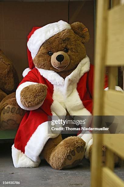 Teddy bear wears a Santa Claus costume at the Steiff stuffed toy factory on November 23, 2012 in Giengen an der Brenz, Germany. Founded by seamstress...