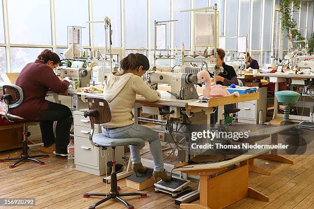 Workers sew at the Steiff stuffed toy factory on November 23, 2012 in Giengen an der Brenz, Germany. Founded by seamstress Margarethe Steiff in 1880,...