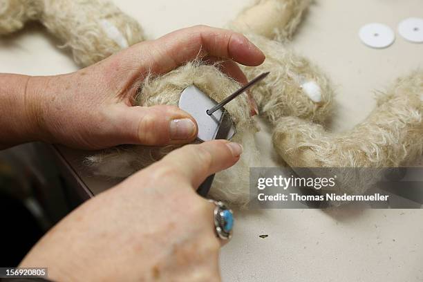 Teddy bear is assembled at the Steiff stuffed toy factory on November 23, 2012 in Giengen an der Brenz, Germany. Founded by seamstress Margarethe...