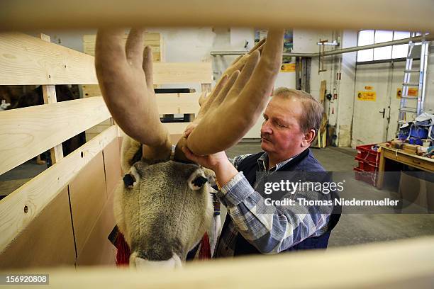 Worker prepares a reindeer at the Steiff stuffed toy factory on November 23, 2012 in Giengen an der Brenz, Germany. Founded by seamstress Margarethe...