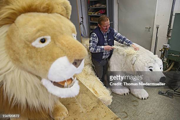 Worker prepares a polar bear at the Steiff stuffed toy factory on November 23, 2012 in Giengen an der Brenz, Germany. Founded by seamstress...