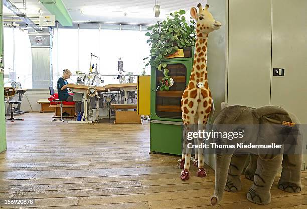 Worker sews at the Steiff stuffed toy factory on November 23, 2012 in Giengen an der Brenz, Germany. Founded by seamstress Margarethe Steiff in 1880,...