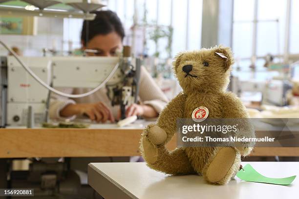 Worker sews at the Steiff stuffed toy factory on November 23, 2012 in Giengen an der Brenz, Germany. Founded by seamstress Margarethe Steiff in 1880,...
