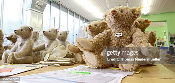 Teddy bears sit on a table at the Steiff stuffed toy factory on November 23, 2012 in Giengen an der Brenz, Germany. Founded by seamstress Margarethe...