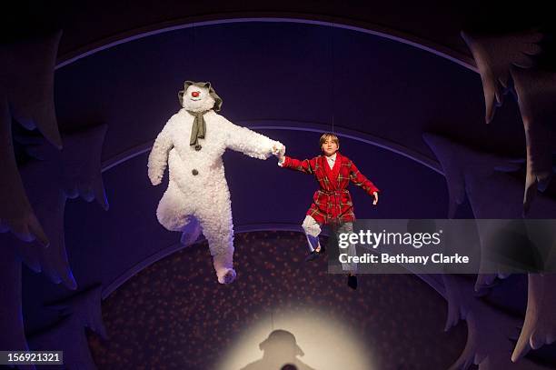 The boy and his snowman rehearse the scene where they fly to the song "Walking in the Air" by Howard Blake at the Peacock Theatre on November 24,...