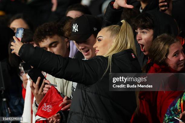 Alisha Lehmann of Switzerland takes a selfie with fans after the FIFA Women's World Cup Australia & New Zealand 2023 Group A match between...