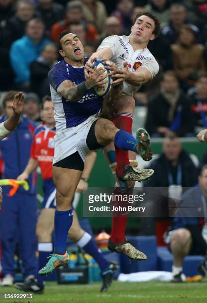 Kahn Fotuali'i of Samoa and Louis Picamoles of France in action during the Rugby Autumn International between France and Samoa at the Stade de France...