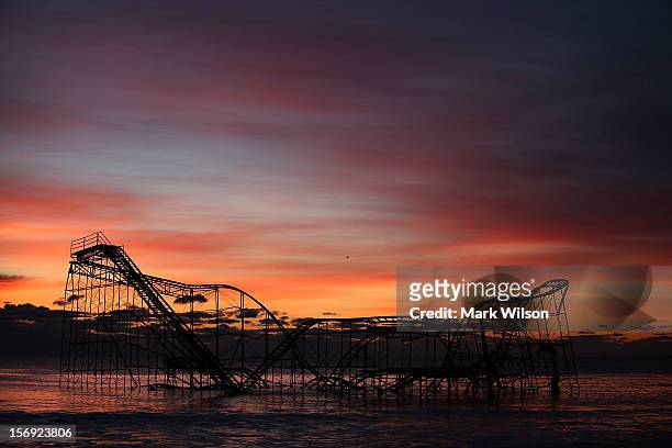 Roller coaster sits in the ocean after the Casino Pier collapsed when Superstorm Sandy hit, on November 25, 2012 in Seaside Heights, New Jersey....