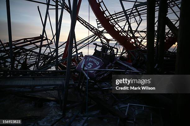 Amusement rides on the Fun Town pier are scattered and damaged by Superstorm Sandy, on November 25, 2012 in Seaside Heights, New Jersey. New Jersey...