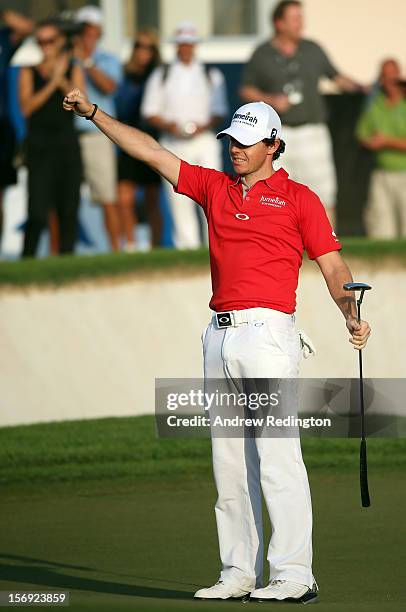Rory McIlroy of Northern Ireland celebrates on the 18th green after winning the DP World Tour Championship on the Earth Course at Jumeirah Golf...