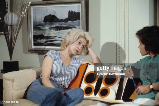 Colleen Gardner, former secretary of Representative John Young, speaks with a reporter in her attorney's apartment in Washington, June 13th 1976. She...