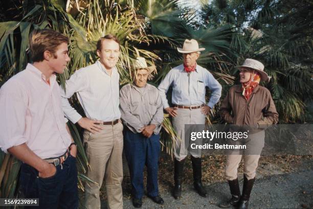 Anne Armstrong, the new US Ambassador to the United Kingdom, on her family's ranch in Texas with two of her sons, a farm worker and husband Tobin,...