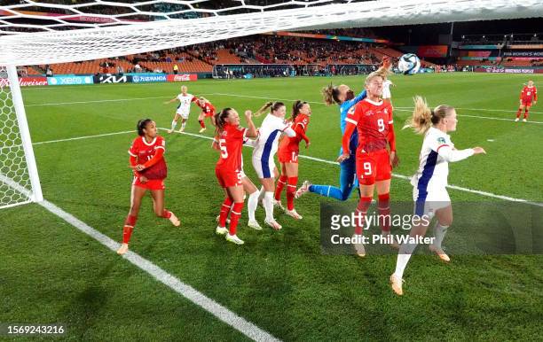 Gaelle Thalmann and Ana-Maria Crnogorcevic of Switzerland attempt to clear the ball during the FIFA Women's World Cup Australia & New Zealand 2023...
