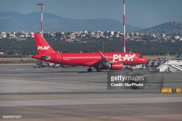 Fly Play or Play low cost airline iconic red Airbus A320neo passenger aircraft as seen in Athens International Airport. Play is an Icelandic low-cost...