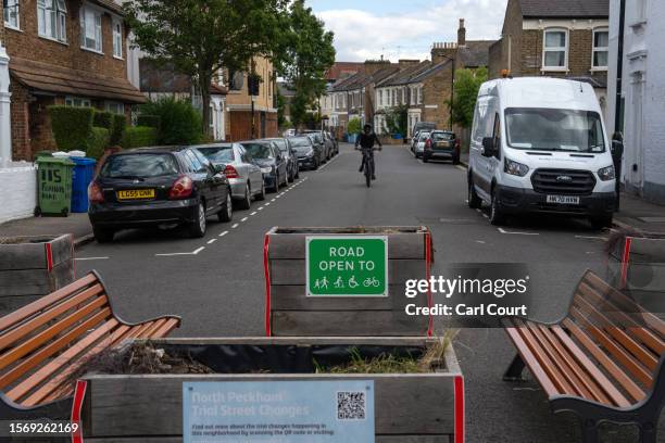 Cyclist approaches a low traffic neighbourhood barrier on August 1, 2023 in London, England. Prime Minister Rishi Sunak has called for a review of...