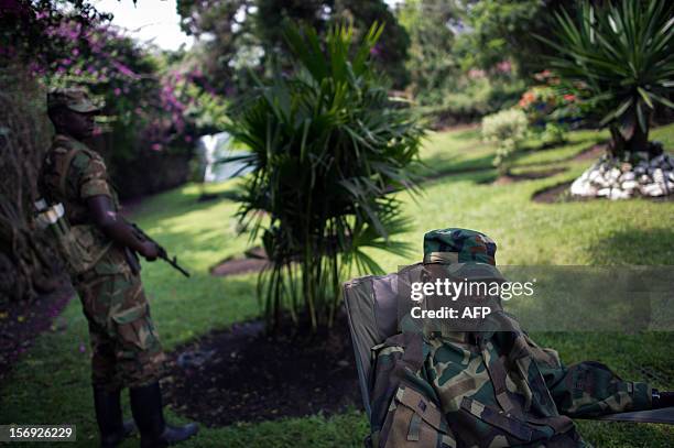 The head of the M23 rebel military forces, Brigadier-General Sultani Makenga , sits on November 25, 2012 in the yard of a military residence in Goma...