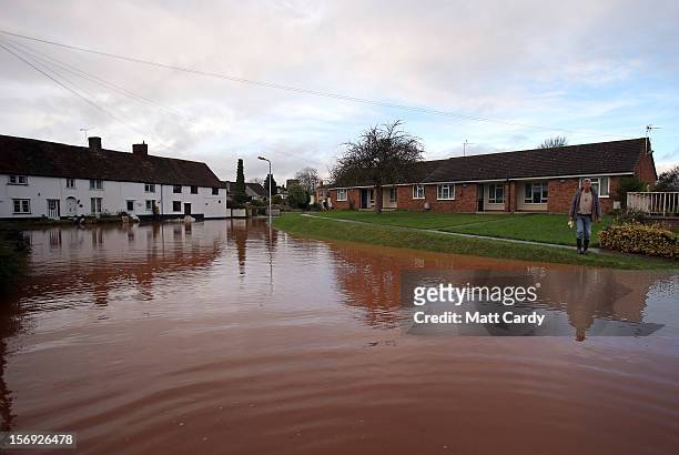 Flood water continues to block the main road through the centre of the village of Ruishton, near Taunton, on November 25, 2012 in Somerset, England....